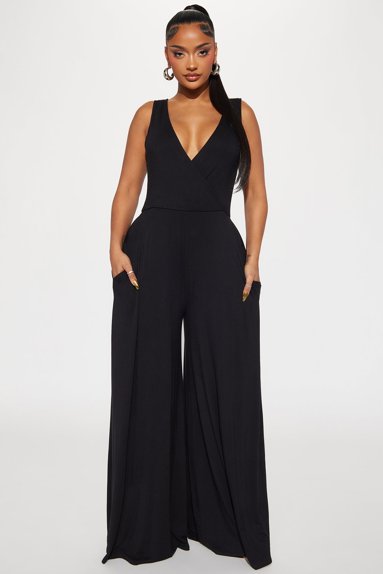 Surplice Sleeveless Wide Leg Jumpsuit with Pockets and Stretch Fabric