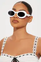 Round Plastic Eyewear with Black and White Options and Standard Lenses